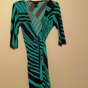 Beautiful wrap dress    Worn one time to a wedding